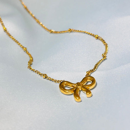 Elegant Gold Bow Pendant